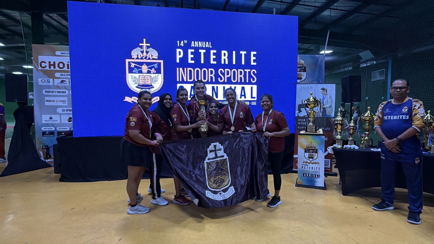 Sparks Netball team with the trophy at St Peter's Indoor Sports Carnival